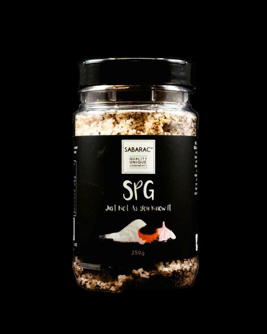 Jar of Sabarac SPG spice blend on a black background